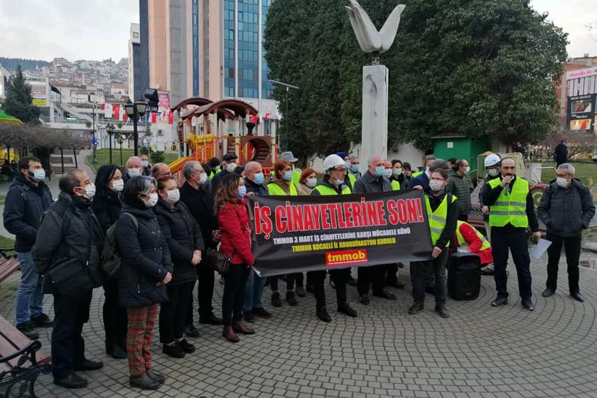 Kocaeli'de yapılan açıklamada İş cinayetlerine son yazılı pankart taşındı.