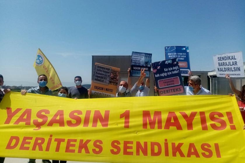 Deriteks üyesi Tuzla Ismaco Tekstil işçileri 'Yaşasın 1 Mayıs' pankartı taşırken.