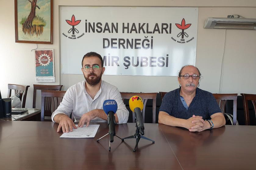 İHD İzmir Şubesi yöneticileri basın açıklamasında bulunurken