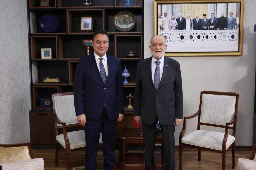 Ali Babacan (solda) ve Temel Karamollaoğlu