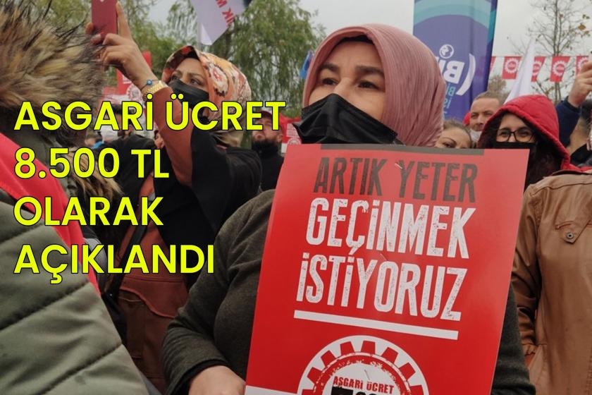 'Geçinmek istiyoruz' yazılı döviz tutan bir kadın işçi