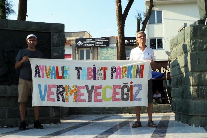 Ayvalık sınırları içerisinde 1. Derece Doğal Sit Alanı olarak yer alan (Güvercin) Manastır Adası ile Sefa Çamlık Mevkilerinin dereceleri düşürüldü.