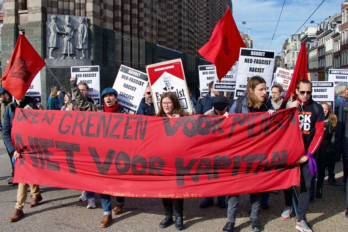 Hollanda'da yürüyüş: Mültecilere kapı açık, kapitalizme değil