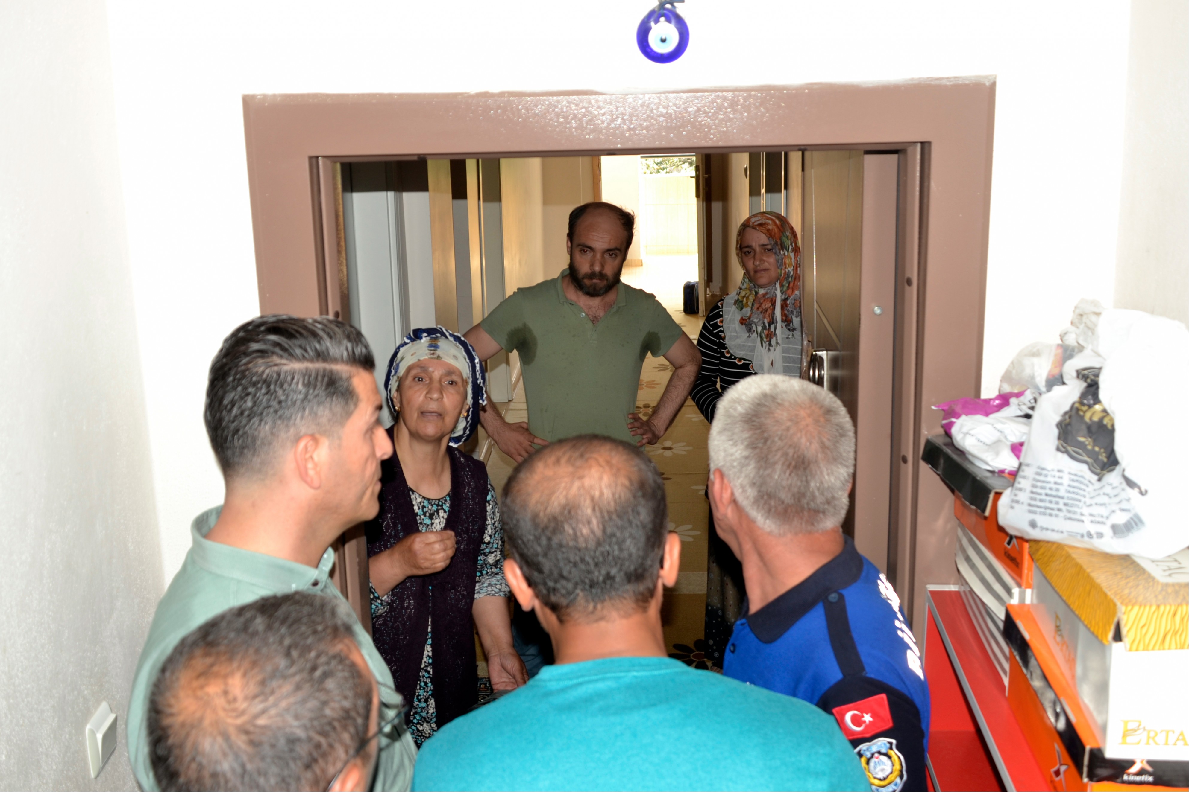 Adana Göl Mahallesi'nde belediyenin evlerini yıkmak istediği yurttaşlar.